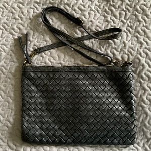 Clutch woven leather handbag
